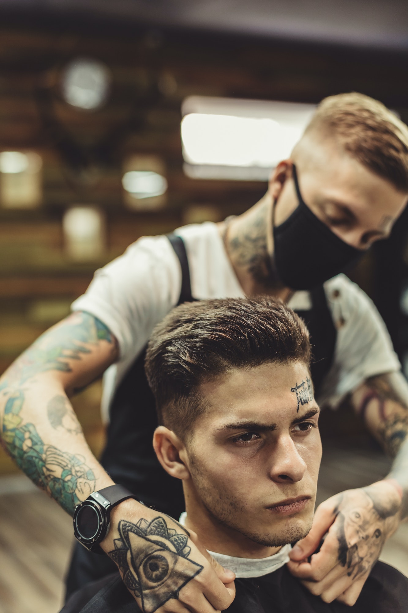 anonymous barber preparing client