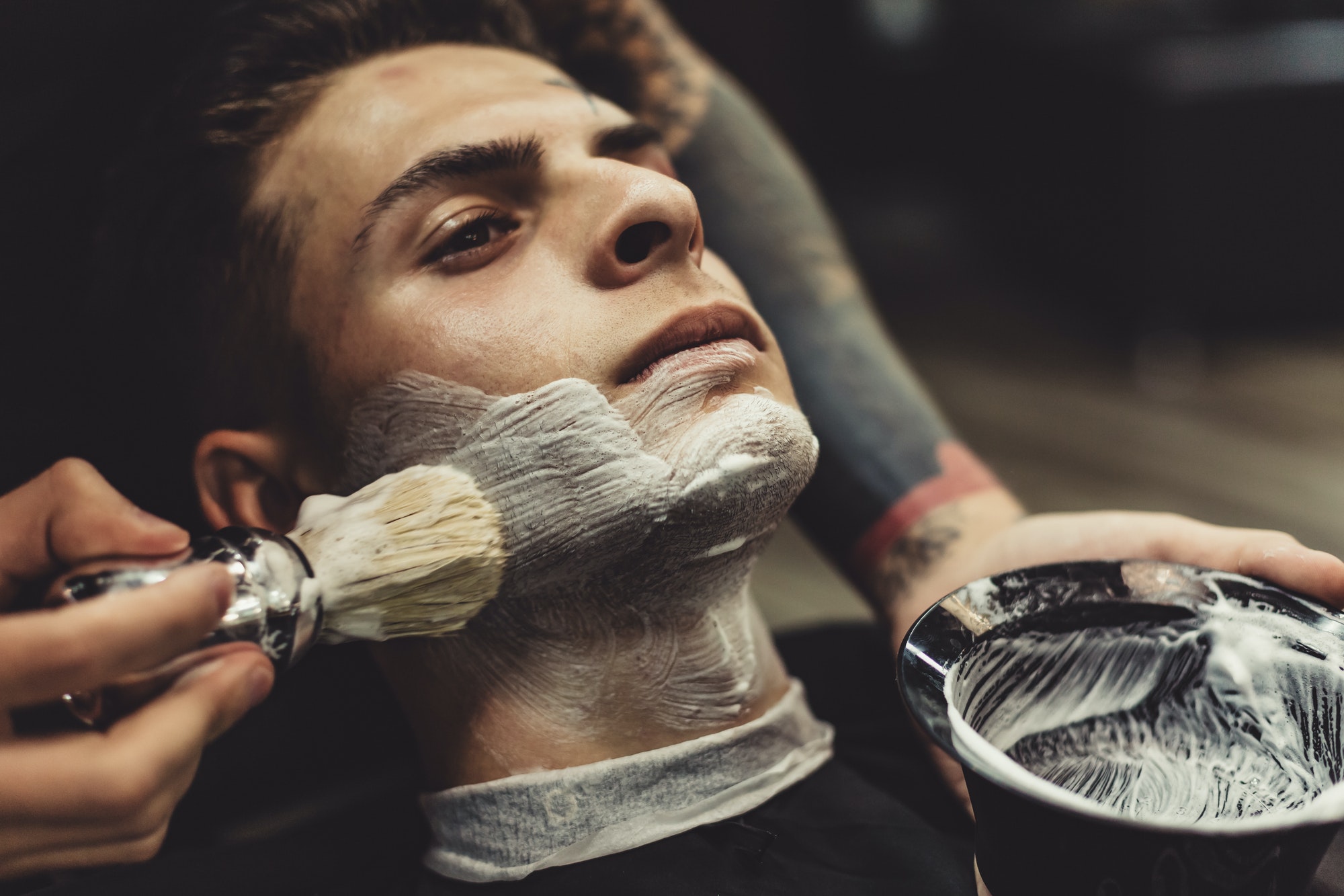 barber shaving client