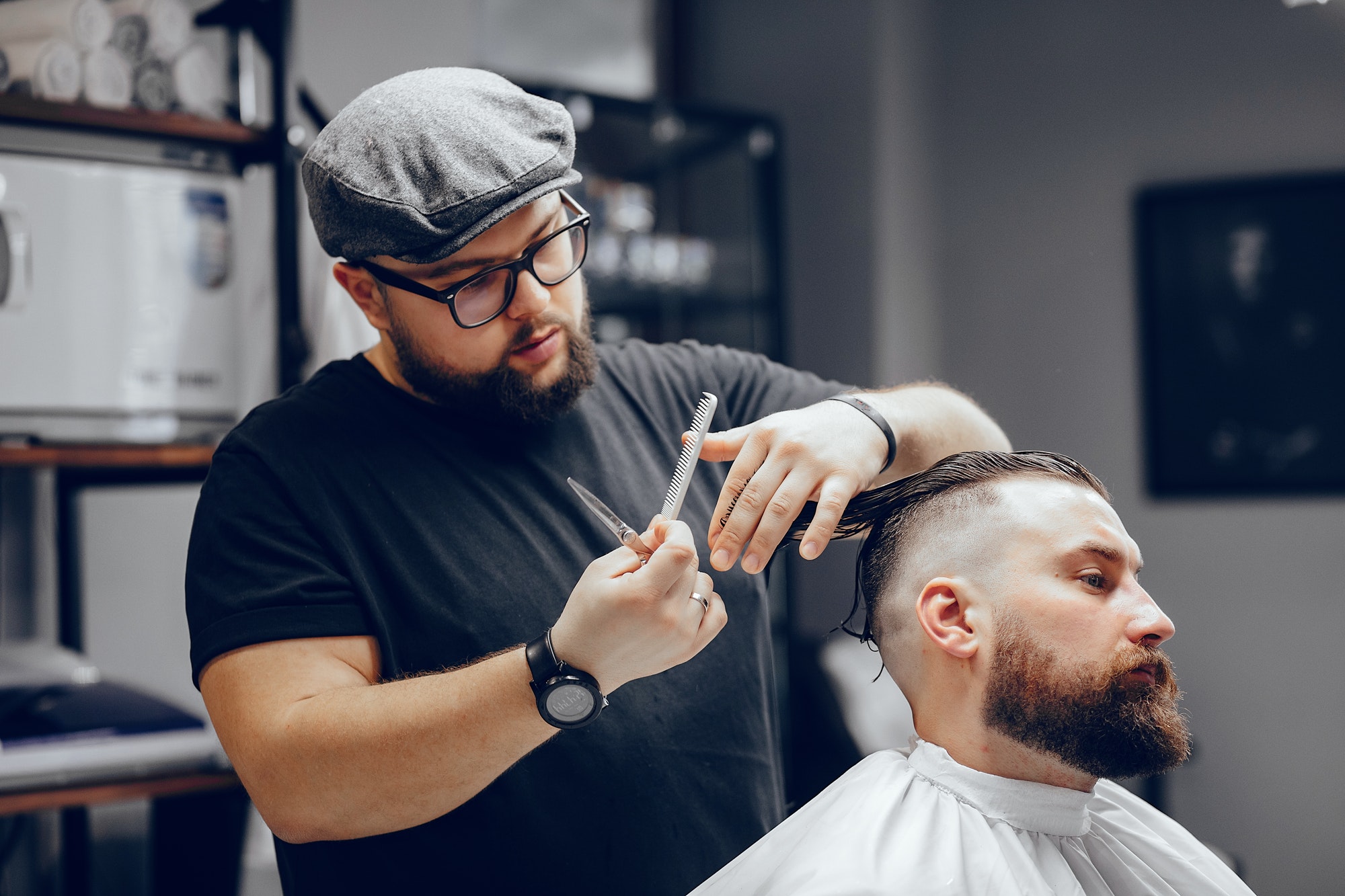 stylish man sitting in a barbershop